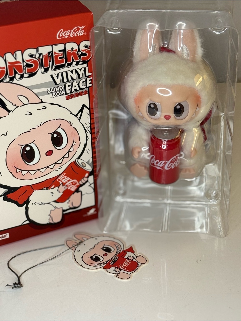 The Monster- Coca Cola Series White Vinyl Face with Red Can Labubu. New!